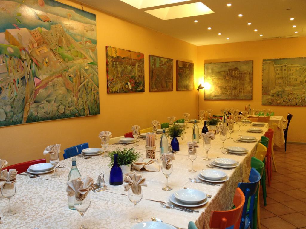 Albergo Ristorante Corsini 帕武洛内尔夫里尼亚诺 外观 照片